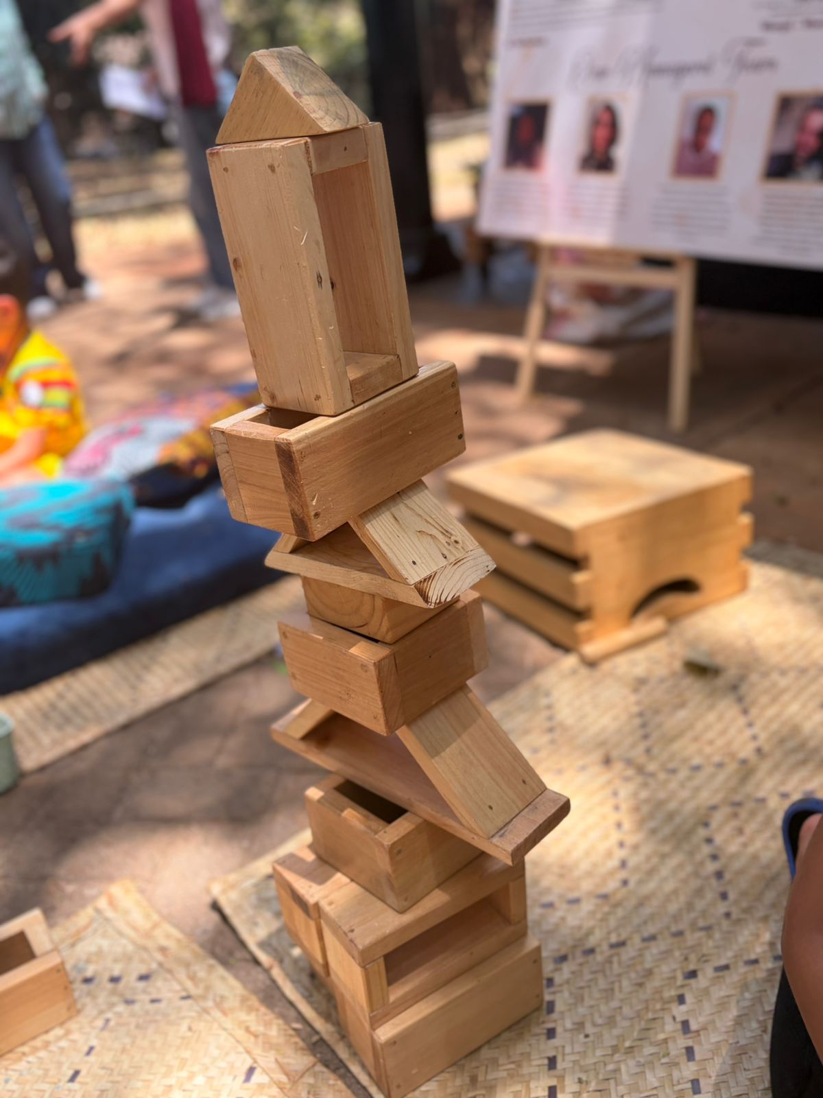 Wooden building blocks stacked and balanced during open-ended play